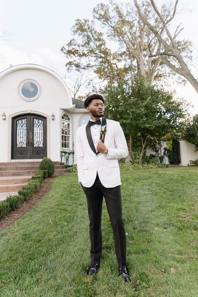 Elegant groom portrait at Morais Vineyards wedding venue