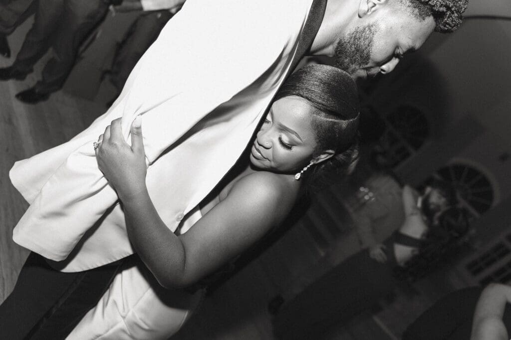 Intimate moment of bride and groom during the wedding reception
