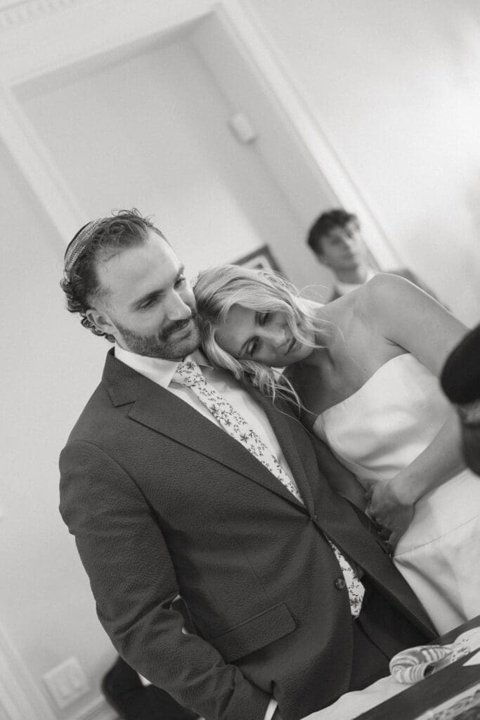 bride and groom hugging during jewish ceremony at Belmont Manor MD