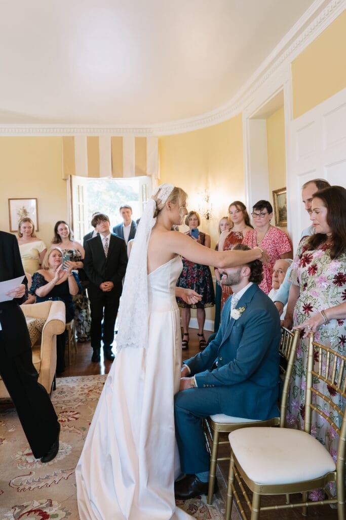 Candid Jewish wedding traditions of bride and groom