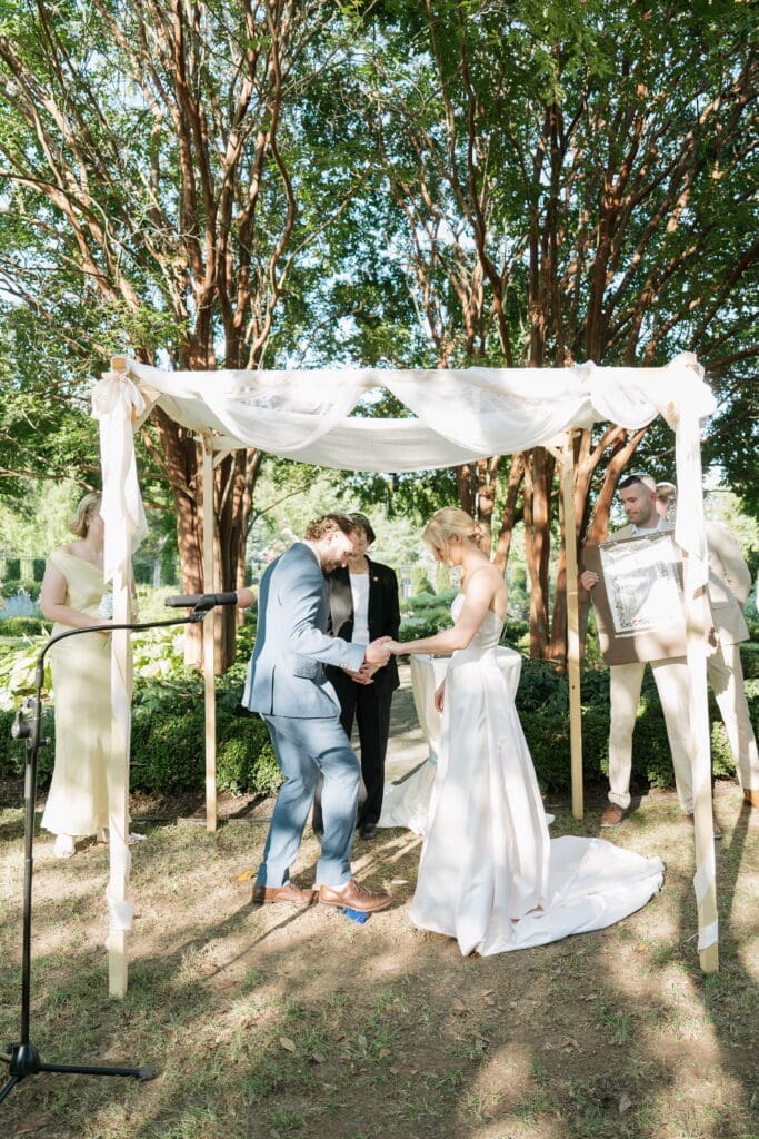 Belmont Manor wedding ceremony under the chuppah in the garden