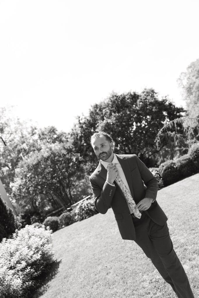 groom portrait walking before the wedding ceremony