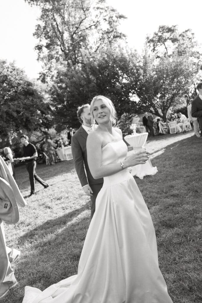Bride enjoying cocktail hour at Belmont Manor MD
