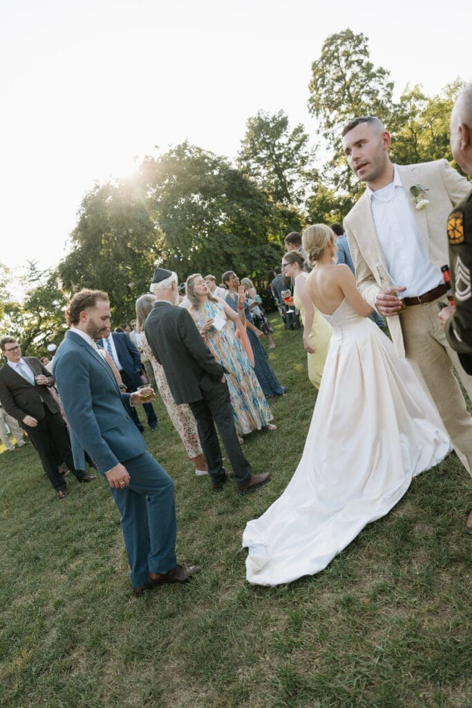 Candid wedding picture during cocktail hour