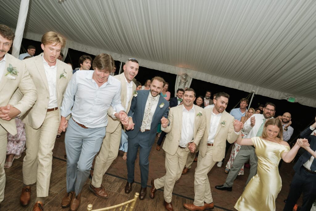 Guests dancing during Jewish wedding hora