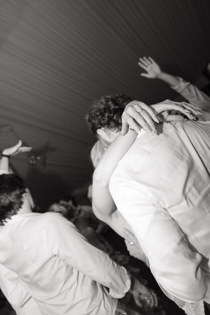Bride and groom candid wedding reception photo