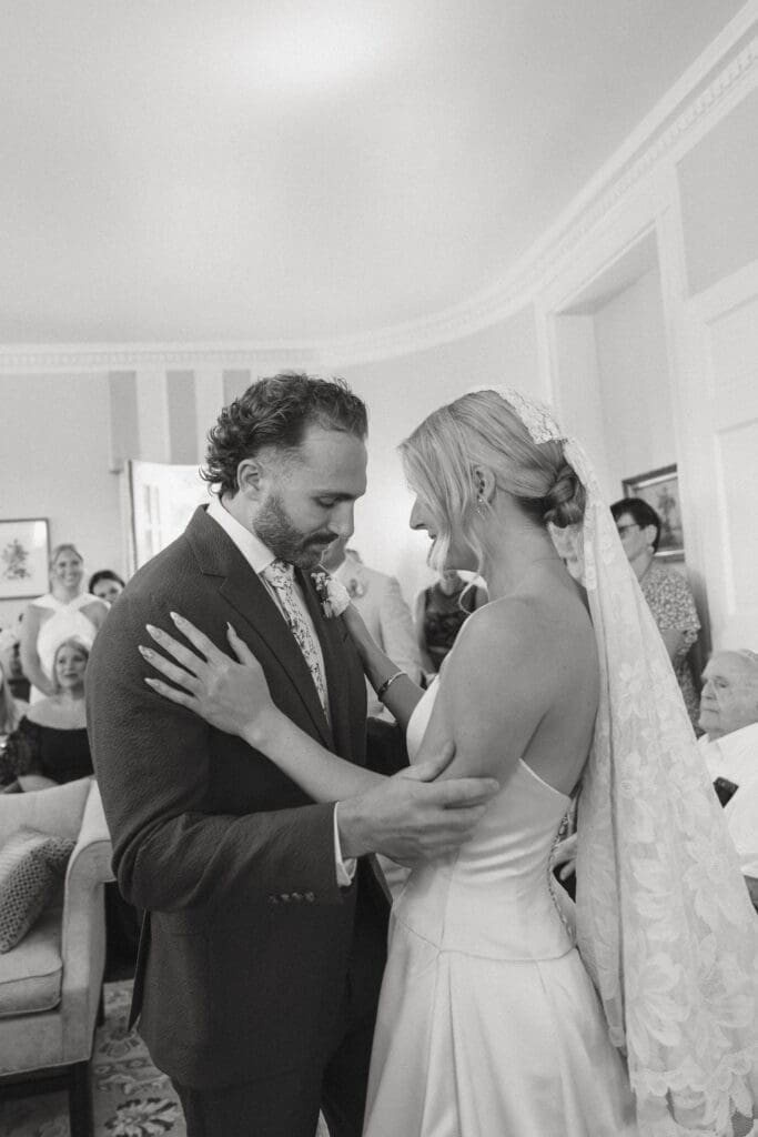 Emotional first look during a jewish wedding ceremony at Belmont Manor venue