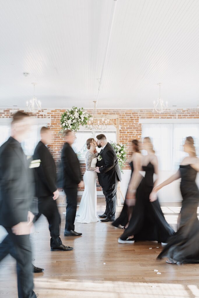 Romantic wedding portrait inside The Woolen Mill wedding venue.