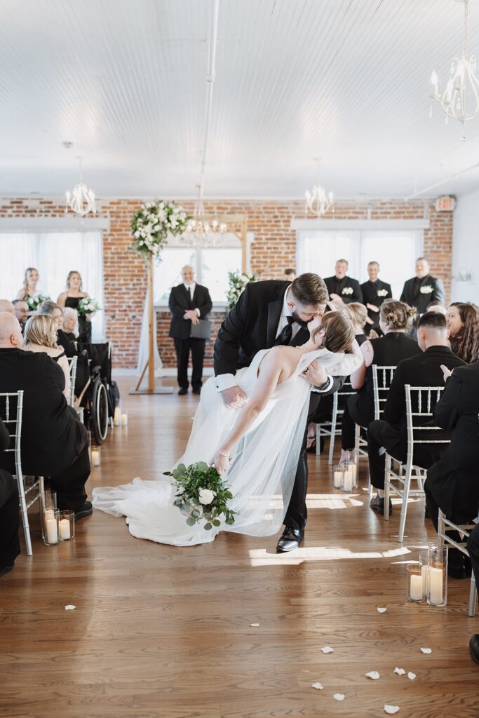 Bride and groom sharing a kiss as newlyweds.