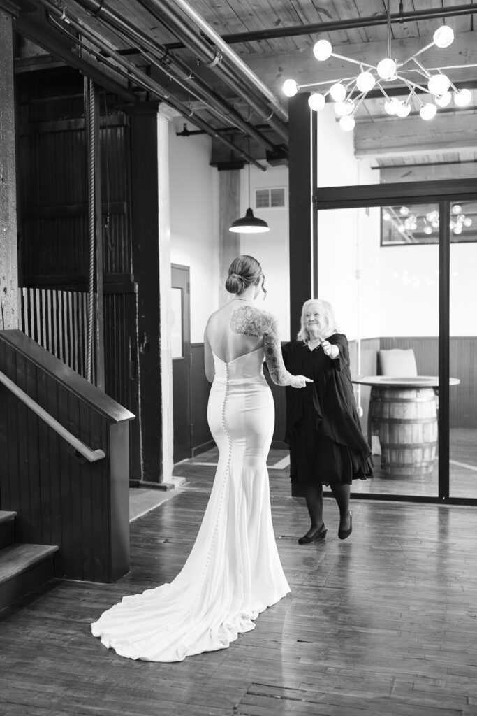 Bride sharing a heartfelt first look with her grandmother before the ceremony.
