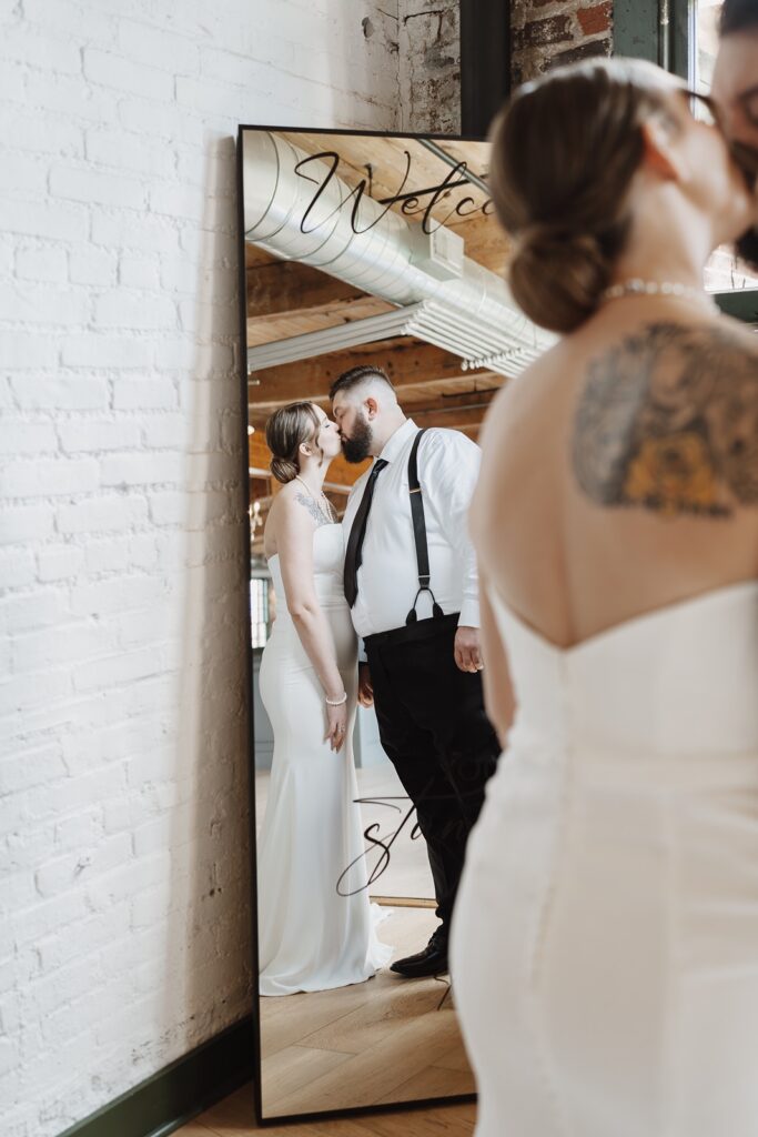 Bride and groom sharing a quiet moment together after the ceremony.