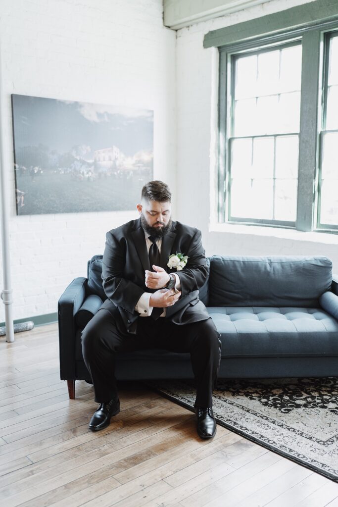 Groom portrait inside The Woolen Mill in Fredericksburg, Virginia.