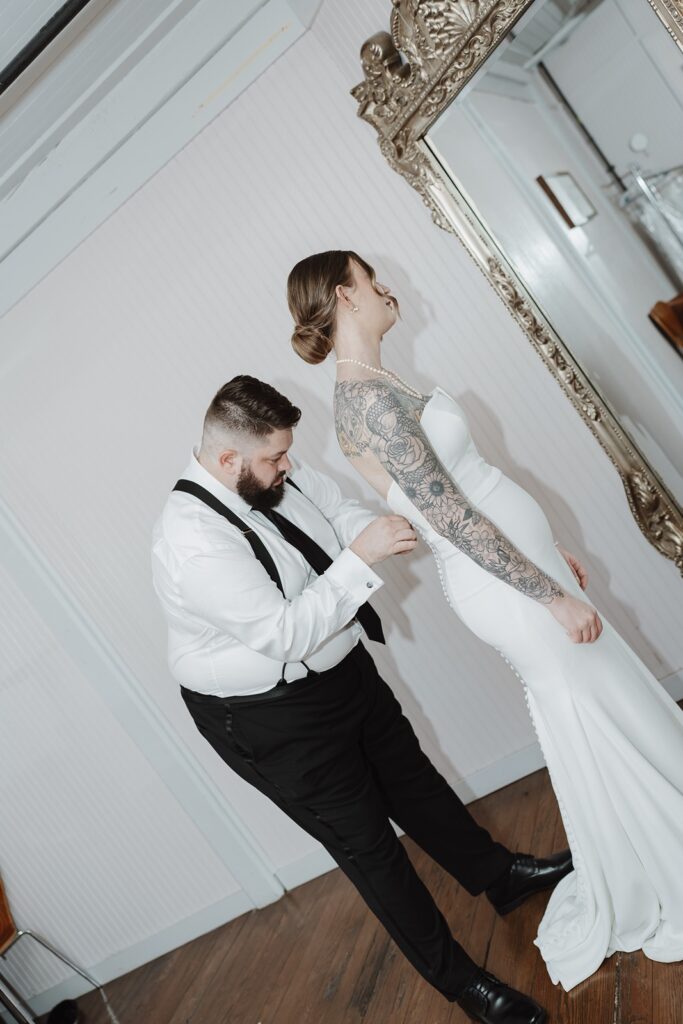 Groom and Bride portraits inside The Woolen Mill.