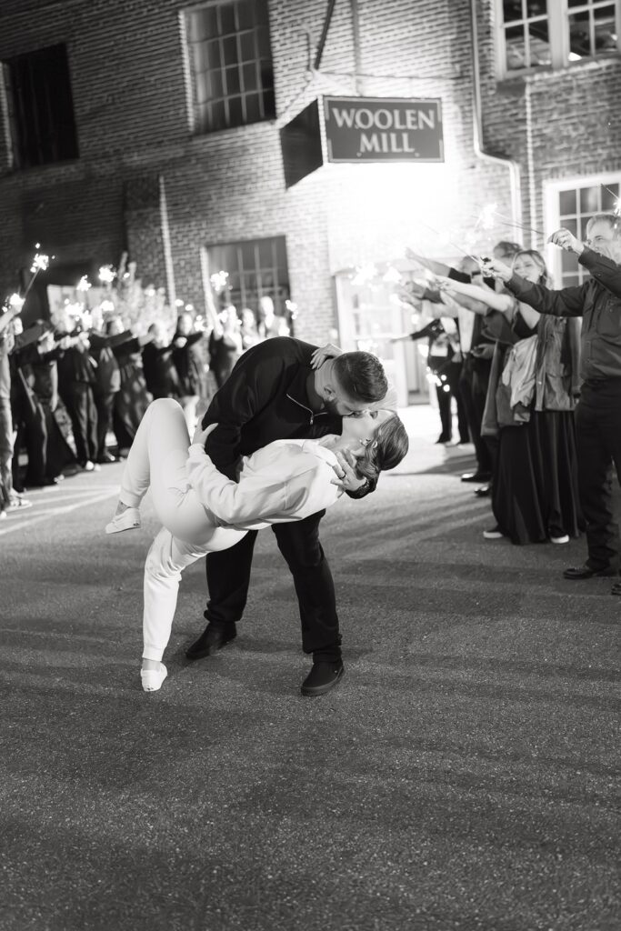 Bride and groom formal exit at The Woolen Mill.
