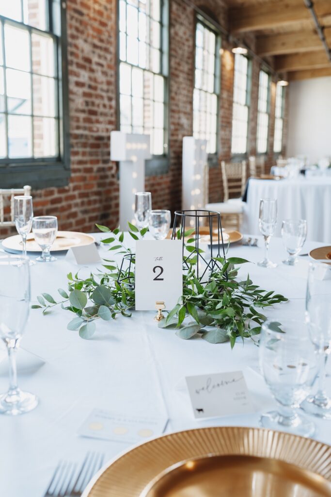 Reception table details at The Woolen Mill wedding venue.